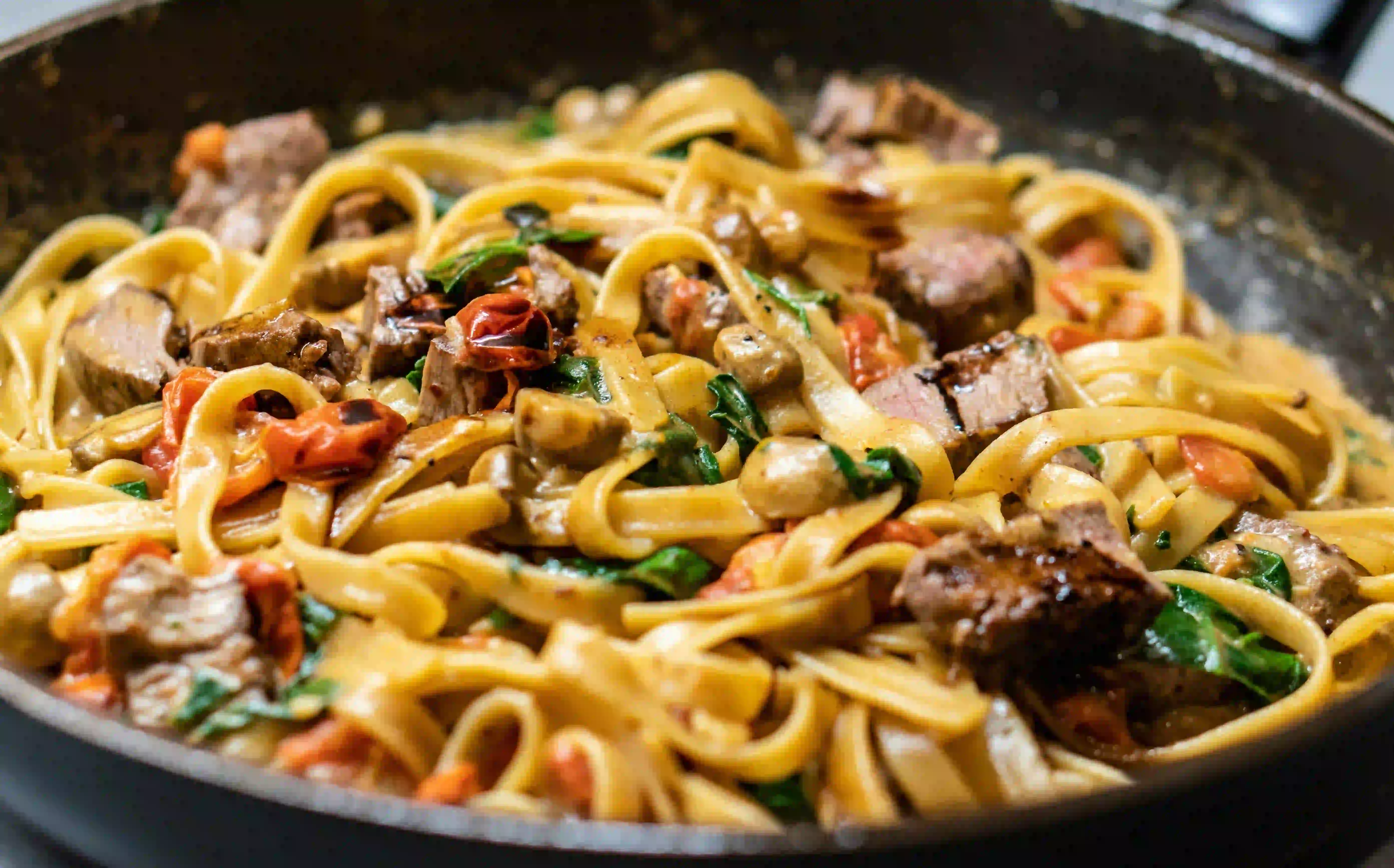 Handmade rice noodles in lemongrass-infused broth with confit duck